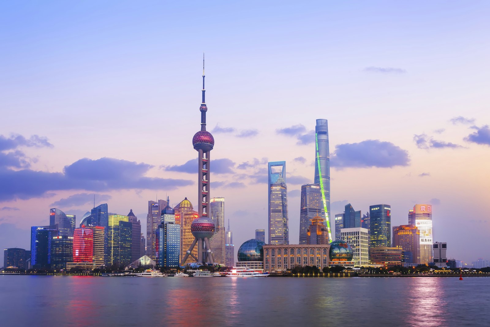 Shanghai's Pudong skyline at dusk seen across the Huangpu River